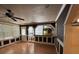 Living room with wood floors, wainscotting, and entry to other areas of the home at 3342 Habitat Blvd Blvd, Johns Island, SC 29455