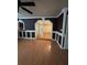 Living room boasts wood floors, custom trim, and doorways to various parts of the house at 3342 Habitat Blvd Blvd, Johns Island, SC 29455