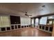 Spacious living area with wood floors, ceiling fan, and custom wainscotting at 3342 Habitat Blvd Blvd, Johns Island, SC 29455