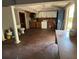 Large room with hardwood floors, white cabinets, a washing machine, and an adjacent small room at 3342 Habitat Blvd Blvd, Johns Island, SC 29455