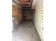 Interior space showing a storage area with wooden walls and shelving, providing ample room at 3342 Habitat Blvd Blvd, Johns Island, SC 29455