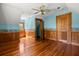 Bedroom featuring wood floors, two closets, and a window with a view at 3936 Lodge Hwy, Smoaks, SC 29481