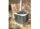 Outdoor air conditioning unit on a concrete pad at 4153 Hickory Ln, Ladson, SC 29456