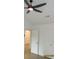 Bright bedroom with ceiling fan and ample closet space, perfect for relaxation at 4153 Hickory Ln, Ladson, SC 29456