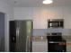 Modern kitchen featuring stainless steel appliances and white cabinets at 4153 Hickory Ln, Ladson, SC 29456