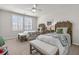 Cozy bedroom with two beds, plantation shutters, and neutral decor at 427 W Respite Ln, Summerville, SC 29483