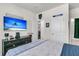 Bedroom with TV, Panthers Ave sign, and modern decor at 427 W Respite Ln, Summerville, SC 29483