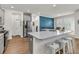 Modern kitchen with a large island, stainless steel appliances, and a stylish backsplash at 427 W Respite Ln, Summerville, SC 29483