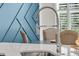 Modern kitchen faucet with spring neck design and view of the dining area at 427 W Respite Ln, Summerville, SC 29483
