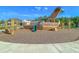 Playground with a wooden pirate ship play structure, slide, swings, and nearby houses at 427 W Respite Ln, Summerville, SC 29483