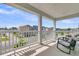 Relaxing covered porch with rocking chairs and views of the community at 427 W Respite Ln, Summerville, SC 29483