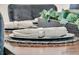 Elegant table setting features decorative napkins and green plant accents in a modern dining space at 427 W Respite Ln, Summerville, SC 29483