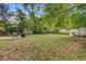 Large backyard with ample space and patio area for outdoor entertainment and relaxation at 4709 Marlboro Pl, North Charleston, SC 29405