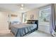 Inviting bedroom features a comfy bed, great natural light, and soothing ambiance for restful nights and bright mornings at 4709 Marlboro Pl, North Charleston, SC 29405