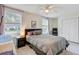 Cozy bedroom featuring a bed, natural light, closet and a serene view for a relaxing and restful environment at 4709 Marlboro Pl, North Charleston, SC 29405