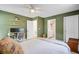 This bedroom features an ensuite bathroom and a convenient workspace, perfect for modern living at 4709 Marlboro Pl, North Charleston, SC 29405