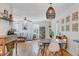 Charming dining area flows seamlessly into the living room for easy entertaining and modern living at 4709 Marlboro Pl, North Charleston, SC 29405