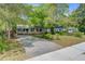 Attractive home with a spacious driveway and well-maintained lawn, perfect for Gathering living at 4709 Marlboro Pl, North Charleston, SC 29405
