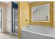 Relaxing bathroom featuring a soaking tub and separate shower for a spa-like experience at 4747 Lewis And Clark Trl, Summerville, SC 29485