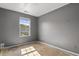 A bedroom with a window offering views of the home's landscaped exterior at 4747 Lewis And Clark Trl, Summerville, SC 29485