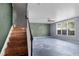 Inviting living room with staircase access, offering a blank canvas for creative design at 4747 Lewis And Clark Trl, Summerville, SC 29485