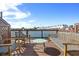 Inviting waterfront deck features stylish seating and scenic views, perfect for outdoor relaxation and entertainment at 4979 Lake Palmetto, North Charleston, SC 29418