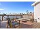 Waterfront deck with wicker furniture, offering relaxing views of the community and waterfront at 4979 Lake Palmetto, North Charleston, SC 29418