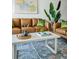 Tastefully designed living room with two couches, patterned rug, and stylish decorations creating a welcoming atmosphere at 4979 Lake Palmetto, North Charleston, SC 29418