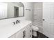 Modern bathroom with a stylish vanity, black hardware, and tiled shower at 521 Savannah Rd, Ladson, SC 29456