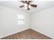 Bedroom with a ceiling fan, natural light, and hardwood-style flooring at 521 Savannah Rd, Ladson, SC 29456