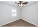 Bedroom with a ceiling fan, natural light, and hardwood-style flooring at 521 Savannah Rd, Ladson, SC 29456