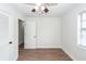 Bedroom with natural light, fresh paint, a ceiling fan, and wood-look flooring at 521 Savannah Rd, Ladson, SC 29456