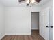 Bedroom with ceiling fan, white trim, and wood-look floors at 521 Savannah Rd, Ladson, SC 29456