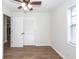 Bedroom with hardwood-style flooring, closet, and natural light at 521 Savannah Rd, Ladson, SC 29456