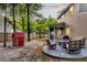 Backyard featuring a patio with outdoor furniture, playhouse, and fenced yard at 5400 Rock Creek Ct, North Charleston, SC 29420