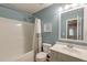 Well-lit bathroom showcasing a tub-shower combination and a vanity with a bright, clean aesthetic at 5400 Rock Creek Ct, North Charleston, SC 29420