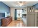 Bright bedroom featuring bunk beds, hardwood floors, and large windows for ample natural light at 5400 Rock Creek Ct, North Charleston, SC 29420