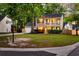 Charming two-story home featuring a covered porch, well-manicured lawn, and inviting curb appeal at 5400 Rock Creek Ct, North Charleston, SC 29420