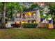 Charming home featuring a well-maintained front yard, a balcony, and a welcoming entrance at 5400 Rock Creek Ct, North Charleston, SC 29420
