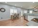 Bright eat-in kitchen features stainless steel appliances, light countertops and wooden floors at 5400 Rock Creek Ct, North Charleston, SC 29420