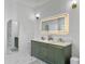 Modern bathroom featuring a double vanity with framed LED mirror and modern finishes at 5403 Diston Ct, North Charleston, SC 29420