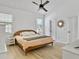 This bedroom features a ceiling fan and two windows for ample natural light at 5403 Diston Ct, North Charleston, SC 29420
