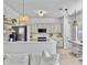 Open-concept kitchen with modern lighting and stainless steel appliances at 5403 Diston Ct, North Charleston, SC 29420