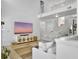 Bright, airy living room featuring a modern TV, high ceiling, and staircase at 5403 Diston Ct, North Charleston, SC 29420