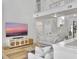 Open-concept living area with a high ceiling, white decor, and a stairway leading up at 5403 Diston Ct, North Charleston, SC 29420
