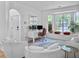 Bright and airy office with large windows, a modern desk setup, and comfortable seating arrangement at 5403 Diston Ct, North Charleston, SC 29420