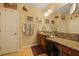 Bathroom with granite countertops and vanity, decorative mirrors, and a neutral color palette for a relaxing spa-like experience at 559 Eastern Isle Ave, Summerville, SC 29486