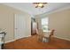 Cozy dining area featuring hardwood floors, white trim, and a table with four chairs at 559 Eastern Isle Ave, Summerville, SC 29486