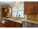 Well-equipped kitchen featuring granite counters, stainless appliances, and ample cabinet space at 559 Eastern Isle Ave, Summerville, SC 29486