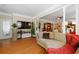 Entertain in style in this living room with hardwood floors, a large sectional sofa, and a seamless flow into other living spaces at 559 Eastern Isle Ave, Summerville, SC 29486